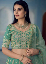 Load image into Gallery viewer, Turquoise Green Organza Lehenga Choli with Dori,Zari, Zarkan &amp; Sequins work