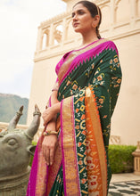 Load image into Gallery viewer, Green &amp; Pink Patola Silk Saree with Zari Border &amp; Tassels On Pallu