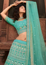 Laden Sie das Bild in den Galerie-Viewer, Light Turquoise Blue Organza Lehenga Choli with Zari, Dori, Resham,Gota &amp; Zarkan work