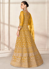 Load image into Gallery viewer, Mustard Yellow Net Anarkali Suit with Heavy Embroidey work