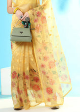 Load image into Gallery viewer, Daffodil Yellow Floral Printed Organza Saree with Embroiderd Butta