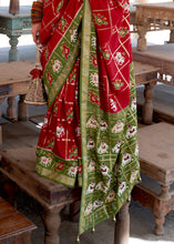 Load image into Gallery viewer, Crimson Red Printed Patola Silk Saree with Zari Border &amp; Tassels on Pallu