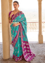 Load image into Gallery viewer, Turquoise Green Printed Patola Silk Saree with Zari Border &amp; Tassels on Pallu