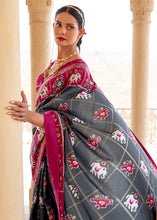 Cargar imagen en el visor de la galería, Stormy Grey Printed Patola Silk Saree with Zari Border &amp; Tassels on Pallu