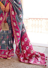 Cargar imagen en el visor de la galería, Stormy Grey Printed Patola Silk Saree with Zari Border &amp; Tassels on Pallu