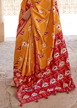 Load image into Gallery viewer, Honey Orange Printed Patola Silk Saree with Zari Border &amp; Tassels on Pallu