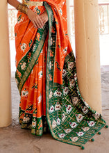 Load image into Gallery viewer, Pumpkin Orange Printed Patola Silk Saree with Zari Border &amp; Tassels on Pallu