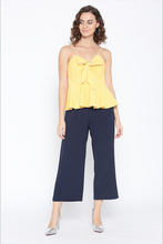 Cargar imagen en el visor de la galería, Front knot peplum top with printed checks