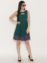 Load image into Gallery viewer, Front cut out skater dress with printed Hem