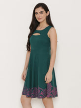 Load image into Gallery viewer, Front cut out skater dress with printed Hem